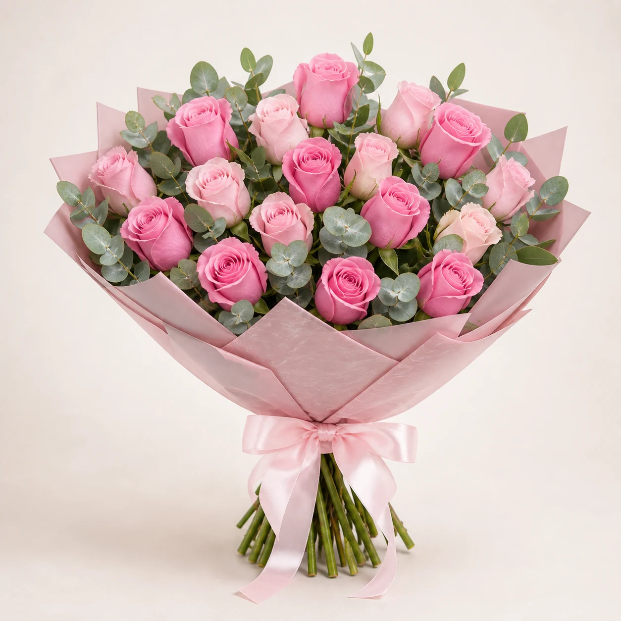 Sweet pink roses and eucalyptus