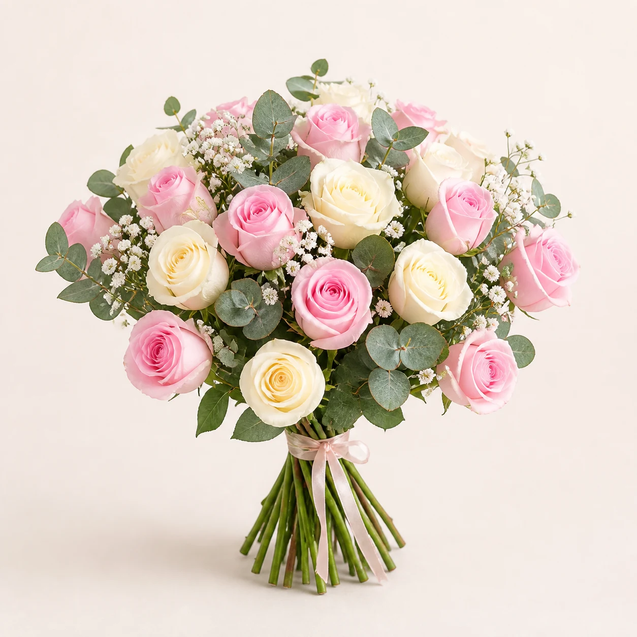 Sweet white and pink roses with eucalyptus